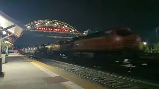 BNSF double stack train passes through Riverside Downtown Station as fireworks go off behind me