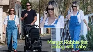 Margot robbie steps out for first time since giving birth joins husband and newborn baby in stroller