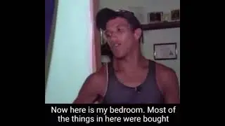 Charles Oliveira shows his home in the Favela