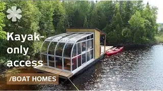 Tiny boat home packs sunroom & dock on remote kayakers' lake