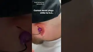 Custom music plugs while he Djs..