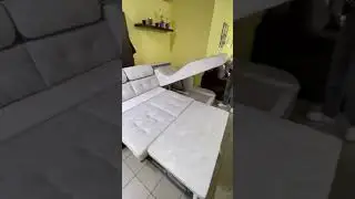 Угловой диван с подсветкой и ортопедической оттоманкой