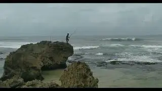 See People Fishing By The Sea
