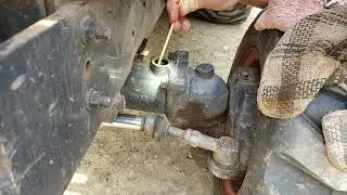 Kubota BX25, Checking front Axle oil level.