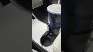 Fit movie cups in your Tesla! 🎥🥤#tesla #cupholder #movies