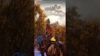 Aloy rides across a quiet path | Horizon Forbidden West