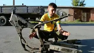 What is the purpose of progression in a motorcycle's rear suspension?