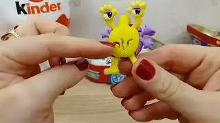 Распаковка раритетного набора Kinder surprise красная машинка Пещерные люди 2003 год.