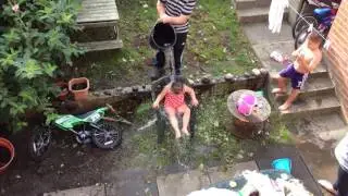 Little girl doing ice bucket challenge
