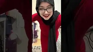 Hijab-wearing woman dances in a tight dress and teases