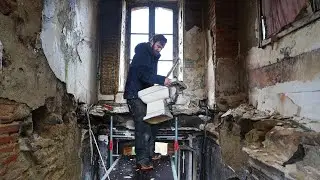Removing the last dangling toilet, 10 metres high.