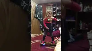 Вита катается на гироскутере дома