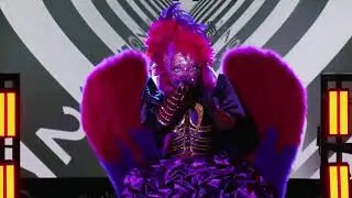 Masked singer night angle perform you give love a bad name