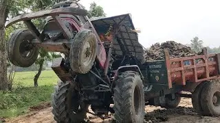 Mahindra 555 di power plus Tractor with fully loaded mud with backhoe machine