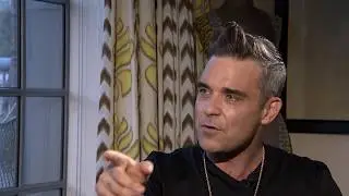 Robbie Williams and his dog Betty Bear. Interview London