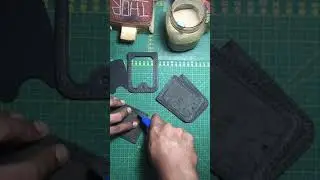 Cutting free hand at the curve area of a veg tan leather