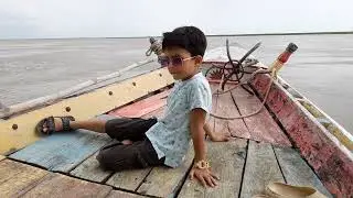 Journey by boat on the Padma river in Rajshahi.