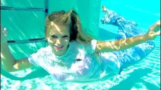 Trina Mason underwater stunt model for hire for IMDB film enjoying swimming in the pool with jeans