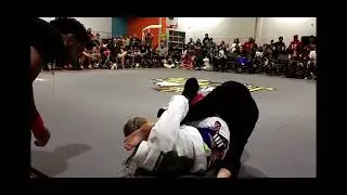 Girls Jiu Jitsu fight (foot touches face)