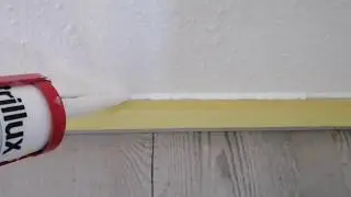 Skirting boards, sealing the junction with the wall with acrylic.