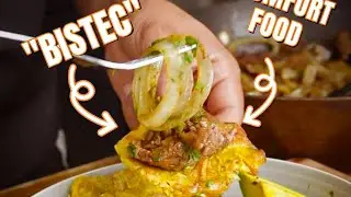 Bistec Encebollado con tostones
