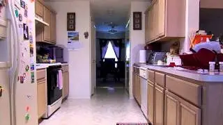 guy running around house with a  bag