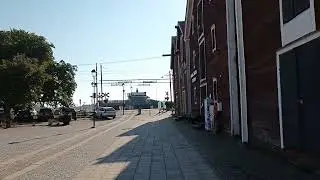 X55 SJ 3000 passerar plankorsning i Hudiksvall