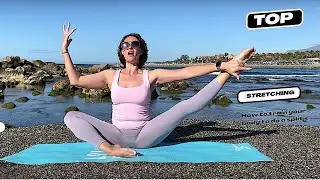 Art yoga on the beach to stretch your legs | Meditation and stretching with gymnastic exercises