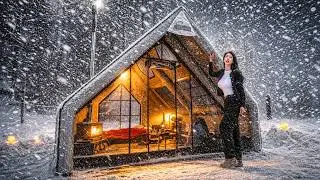 CAMPING IN HEAVY SNOW WITH A TRACTOR IN A NEW INFLATABLE TENT