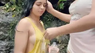 Yanina Molina Helping sista in waterfall 