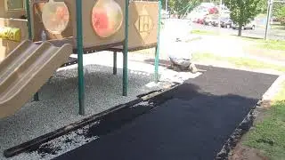 base layer installation on aggregate around play equipment