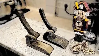 The device for splitting of nuts from a tree. Nutcracker the hands