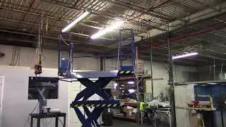 VERTI-LIFT DOUBLE SCISSOR OPERATOR LIFT