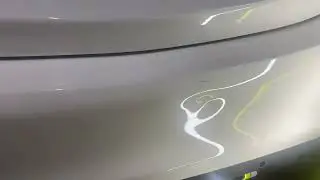 Roy Mataga Paintless Dent Removal of a bumper dent