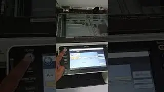 mencoba touchscreen mesin fotocopy warna