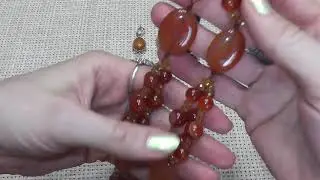 TOURMALINE, GARNET, CHRYSOLITE, AGATE, ZOISITE, PINK QUARTZ, FLUORITE. BEADS AND NECKLACES.