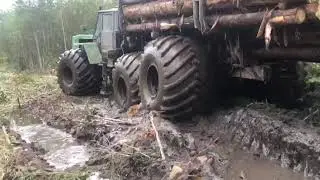 Т-150 болотоход. 3х мостовый лесовоз с манипулятором