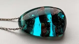 OWN HAND-HANDED PENDANTS OF BONE AND EPOXY RESIN