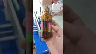 Máy dán nhãn tự động mini, Máy dán nhãn chai tròn băng tải lăn 0916311442