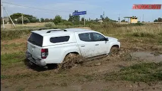 Mitsubishi L200. Отличный внедорожник за хорошие деньги.
