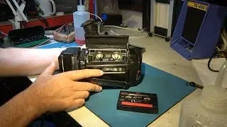 Hi8 tape (not very) stuck in camcorder, Fuji tape (not very) stuck together.