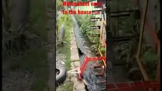 Waterwheel next to the house 