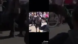 Mad man at protest gets beat up