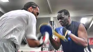 Jeff Mayweather works with an amateur boxer at the Mayweather Boxing Club