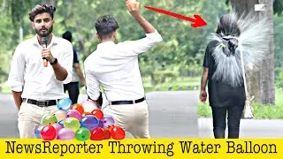 News Reporter Throwing Water Balloons Prank 