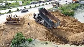 New Update Processing !! Powerful Old Bulldozer Pushing Soil Into Water With Dump Truck Land Filling