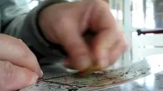 Scratching Off a $5 IInstant Scratch Off Ticket