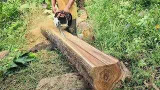 The skill of a chainsaw operator is sawing wood to make rams for house doors