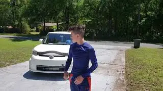 13yo Ryan drives car for first time on driveway