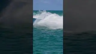 Blue Blackfin center console splashing at the Haulover Inlet